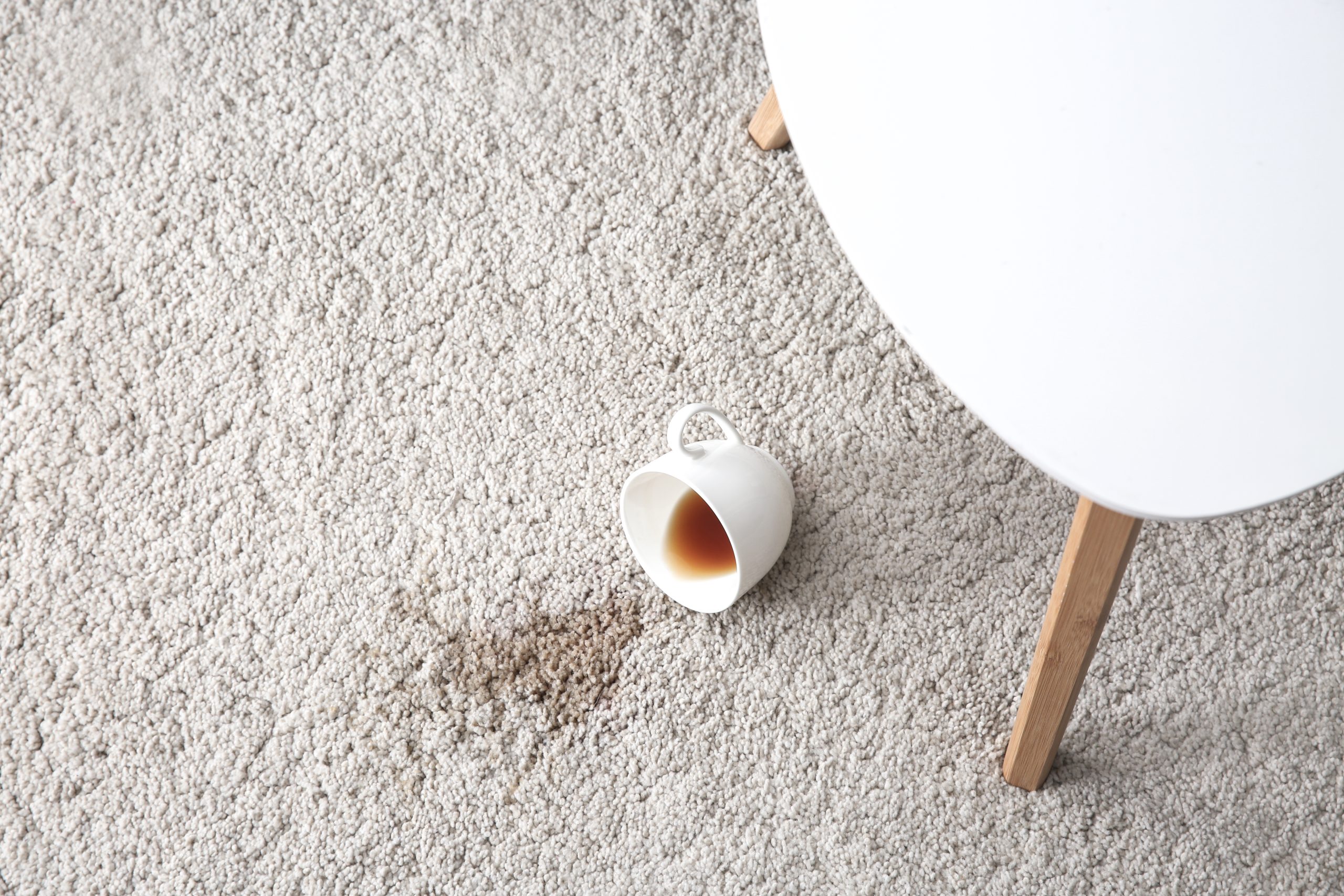 Cup,Of,Coffee,Spilled,On,Carpet